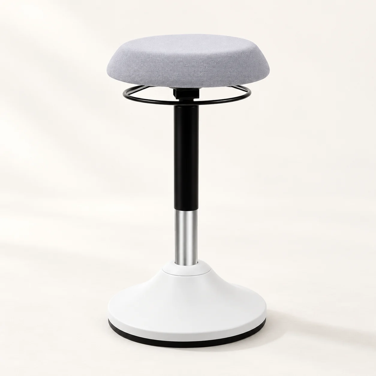 Light grey C07-3 round seat stool with a white rocking base